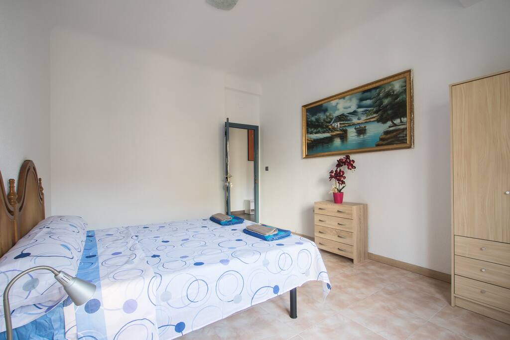 The same double bedroom with king size bed and views at the city hall, from another angle