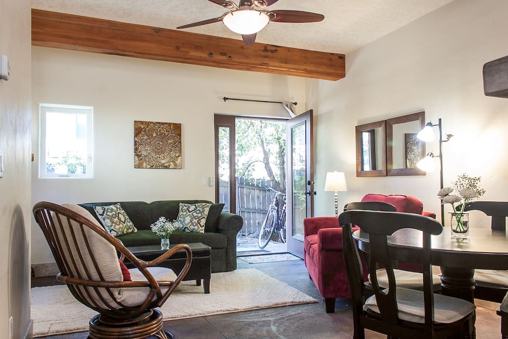 Casa Sol living and dining. Exposed beams and heated concrete floors.