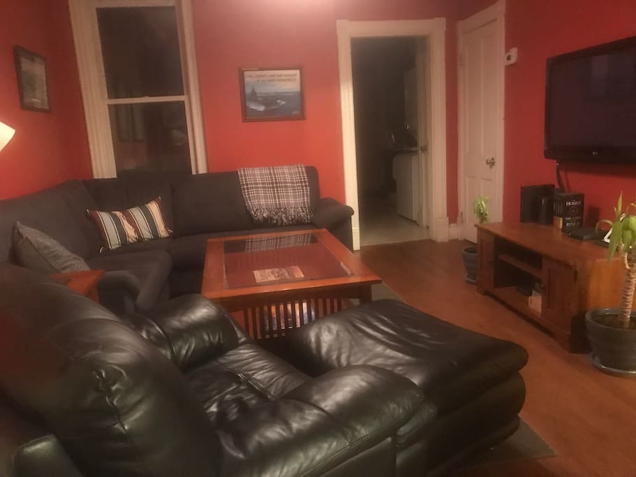 Living room with great couch and TV!