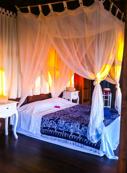 Dream away your worries in your romantic Queen size bed with a view.