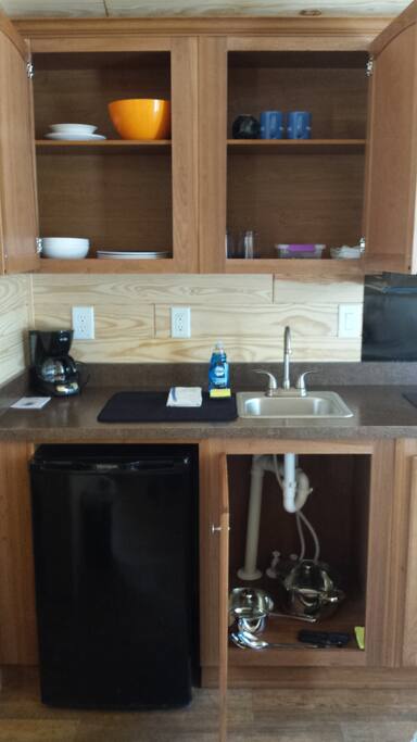 We provide dishes, cups, utensils, coffee maker, pots & pans, and more.