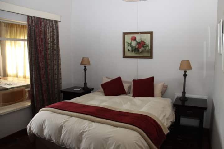 Bedroom 2 and Bedroom three are in the west wing and share a bathroom