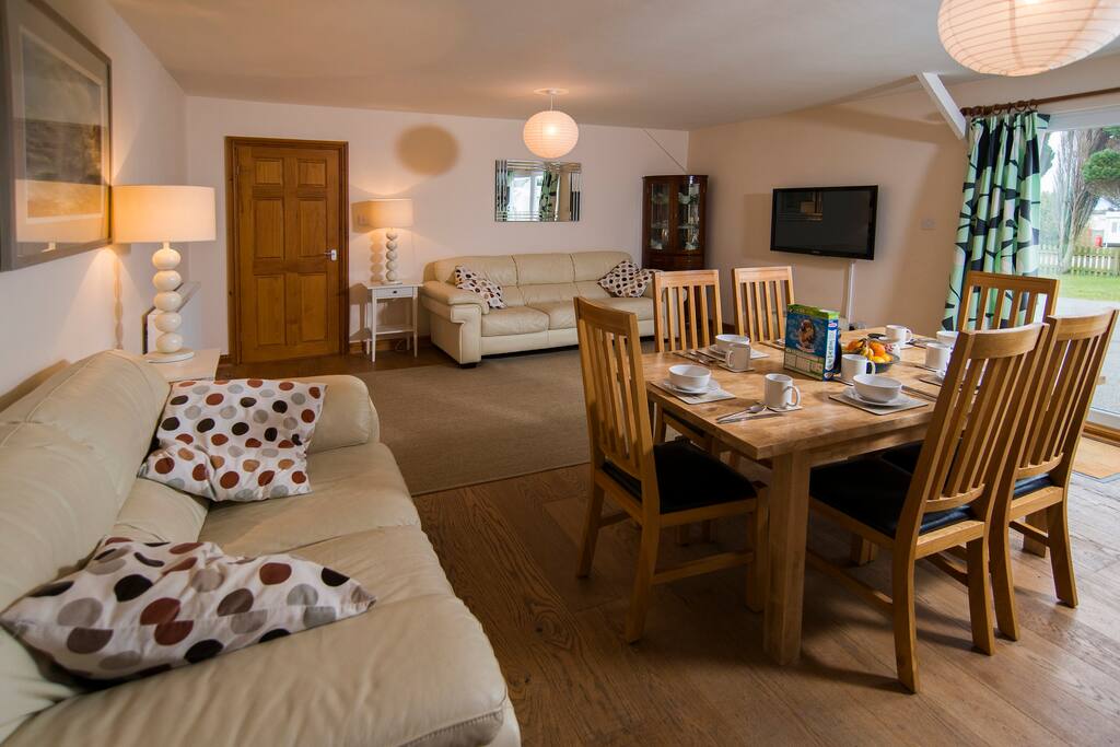 Open living space with comfortable sofas, perfect for relaxing.