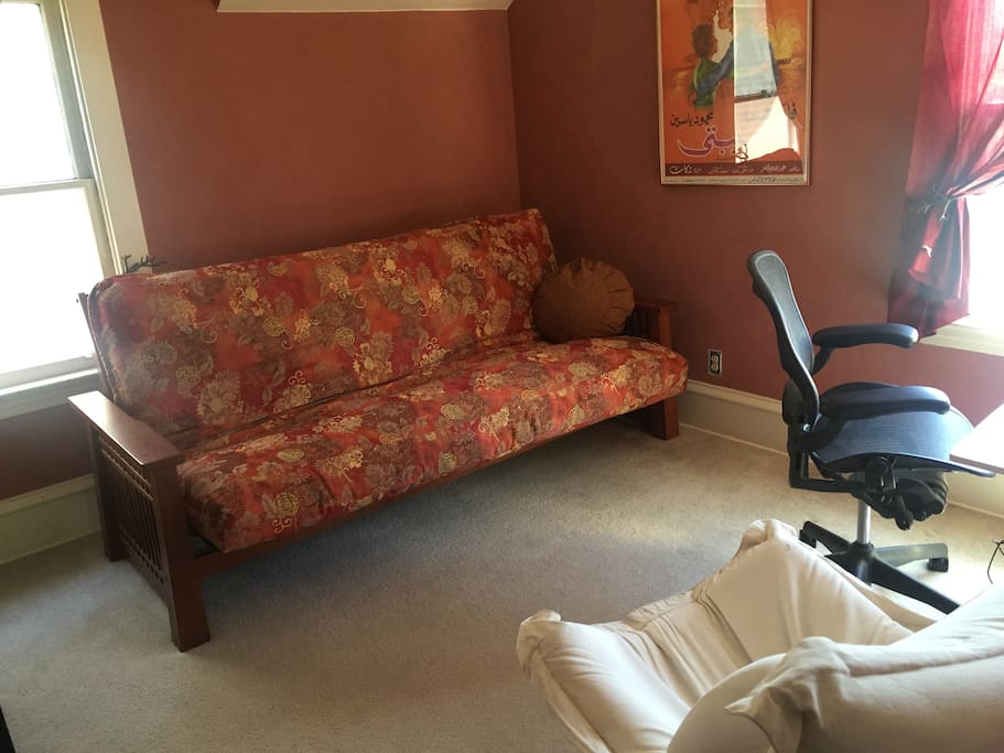 Your bedroom has a comfy queen-sized futon, a beautiful southern exposure, a dresser and closet, upholstered rocking chair, and desk.