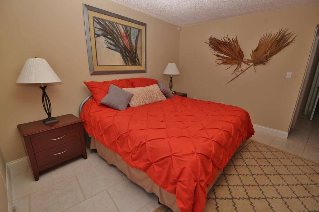 Master Bedroom with a king size bed.