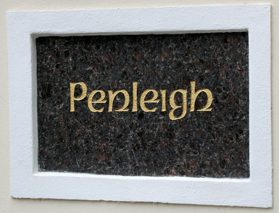 House name plate on entrance wall