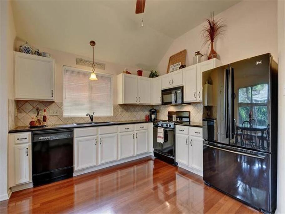 Well appointed, fully stocked kitchen.