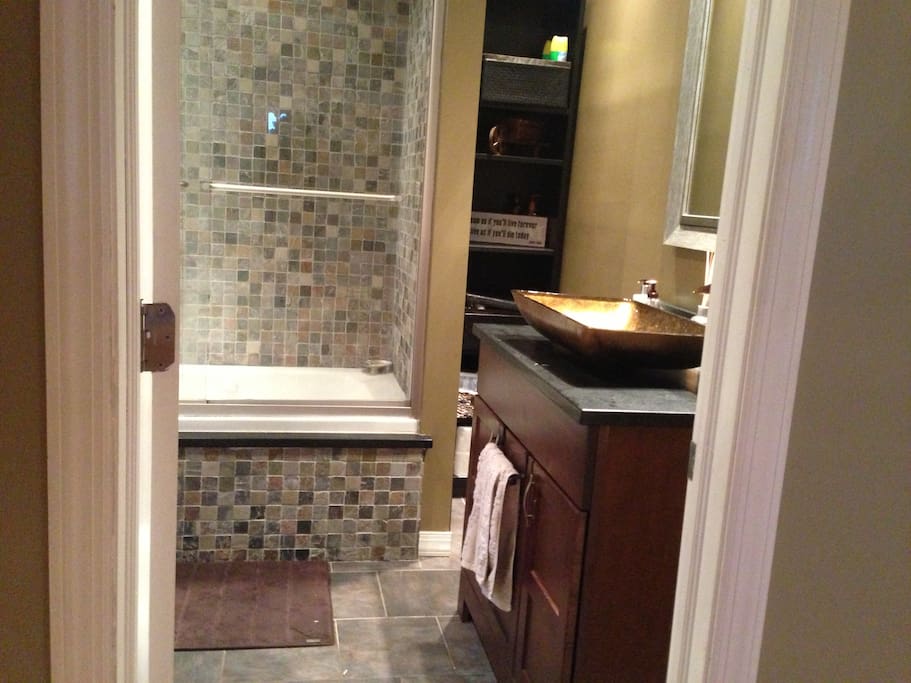 Bathroom has a whirlpool tub.