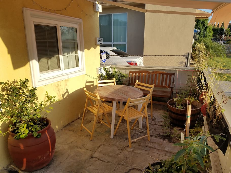 Retractable awning. Provides pleasant hangout spot, especially in the morning.