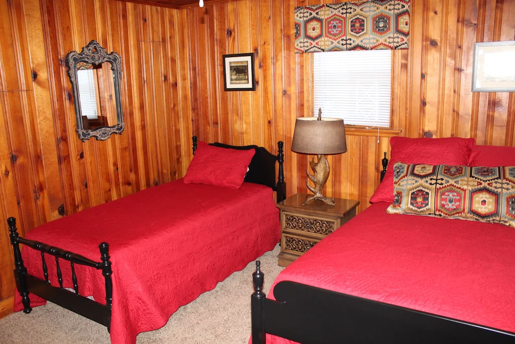 Bedroom 2 with full bed and twin