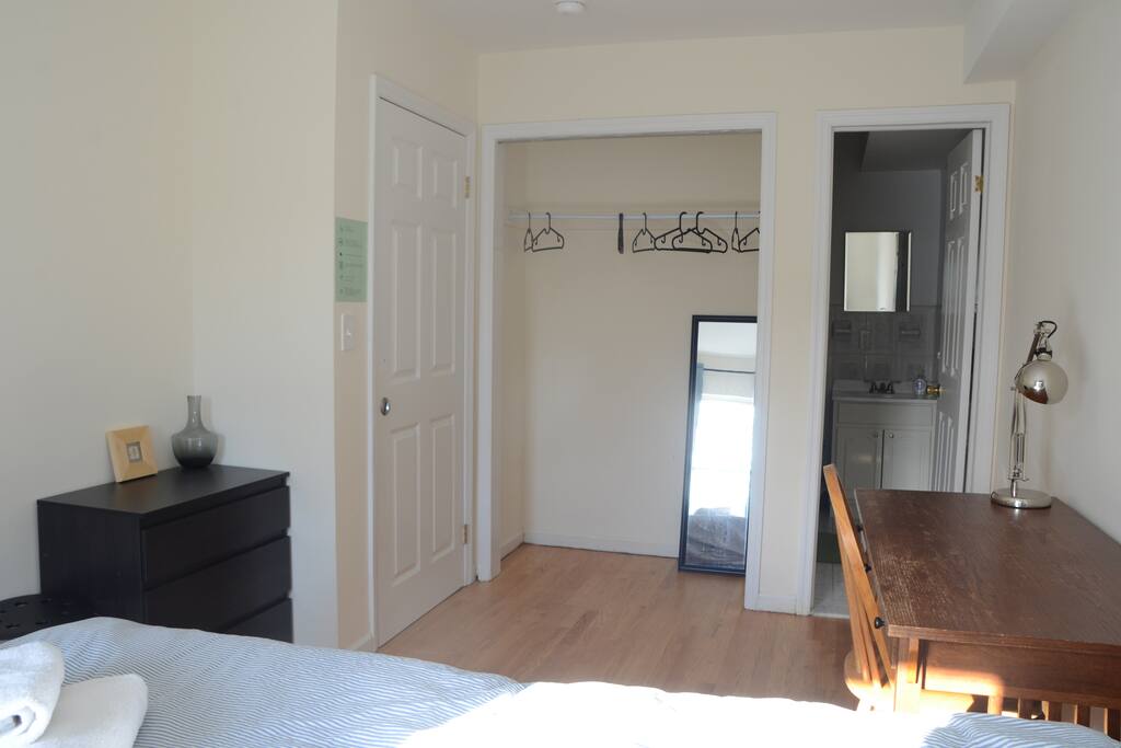 your bedroom with closet and private bathroom