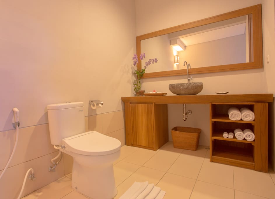 Your private spacious bathroom with amenities, towels and hot & cold water for shower.