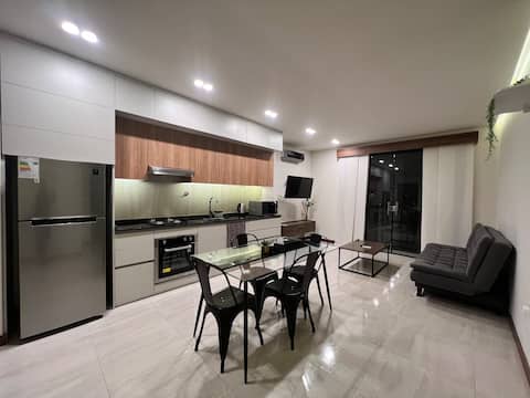 Centrally located and modern, steps away from the square