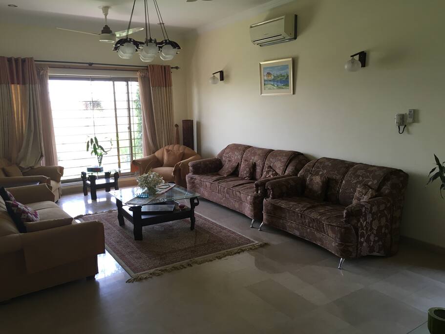 Formal living room can sit up to 10 people