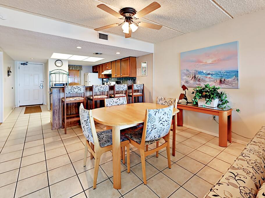 Enjoy meals at the dining table or at the casual breakfast bar for four.