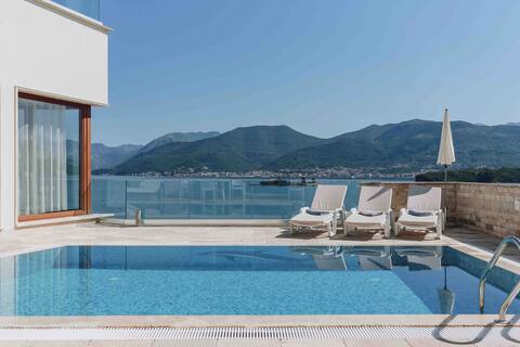 Villa Semiramis with own beach and pools
