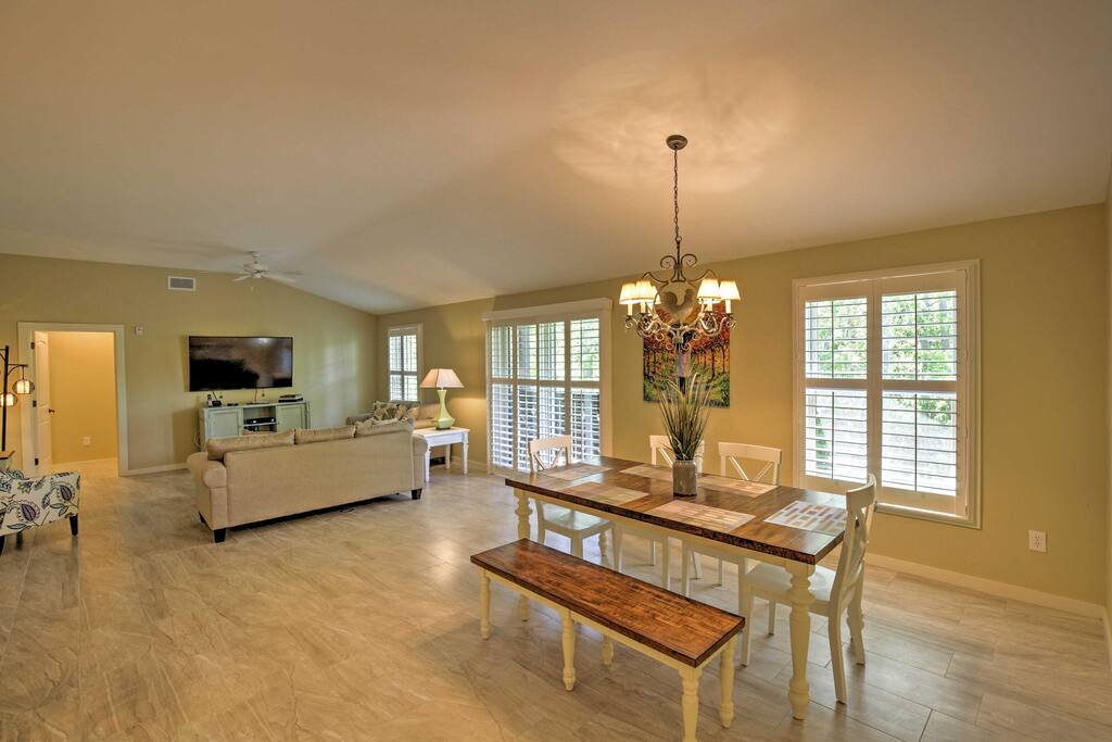 Vaulted ceilings and beautiful tile floors greet you as you enter the home.