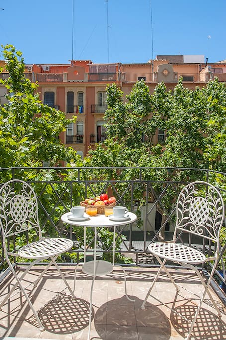 Sunny street facing balcony with views