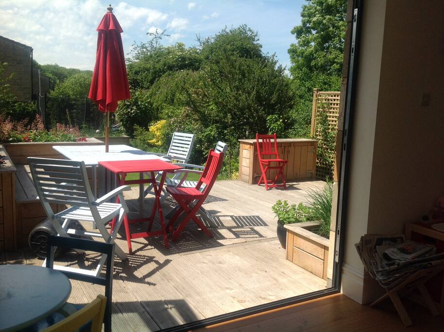 Tri-fold doors open out onto the deck