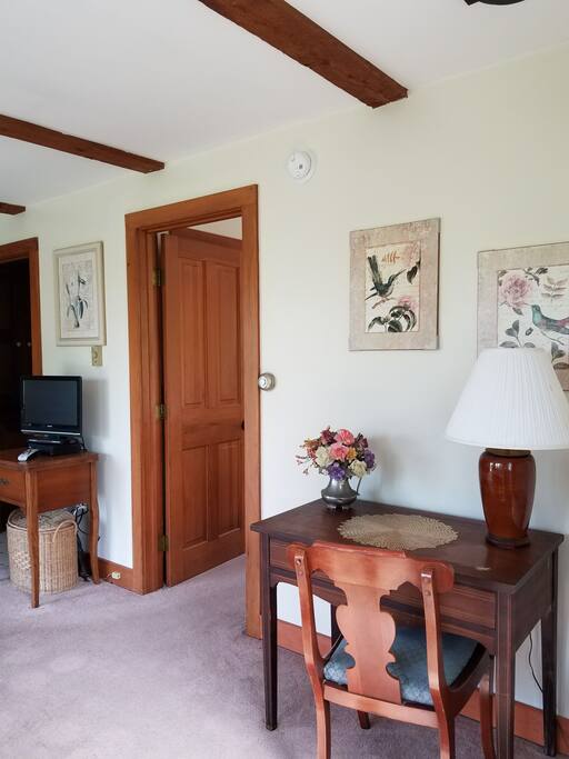 living room with desk and TV area
