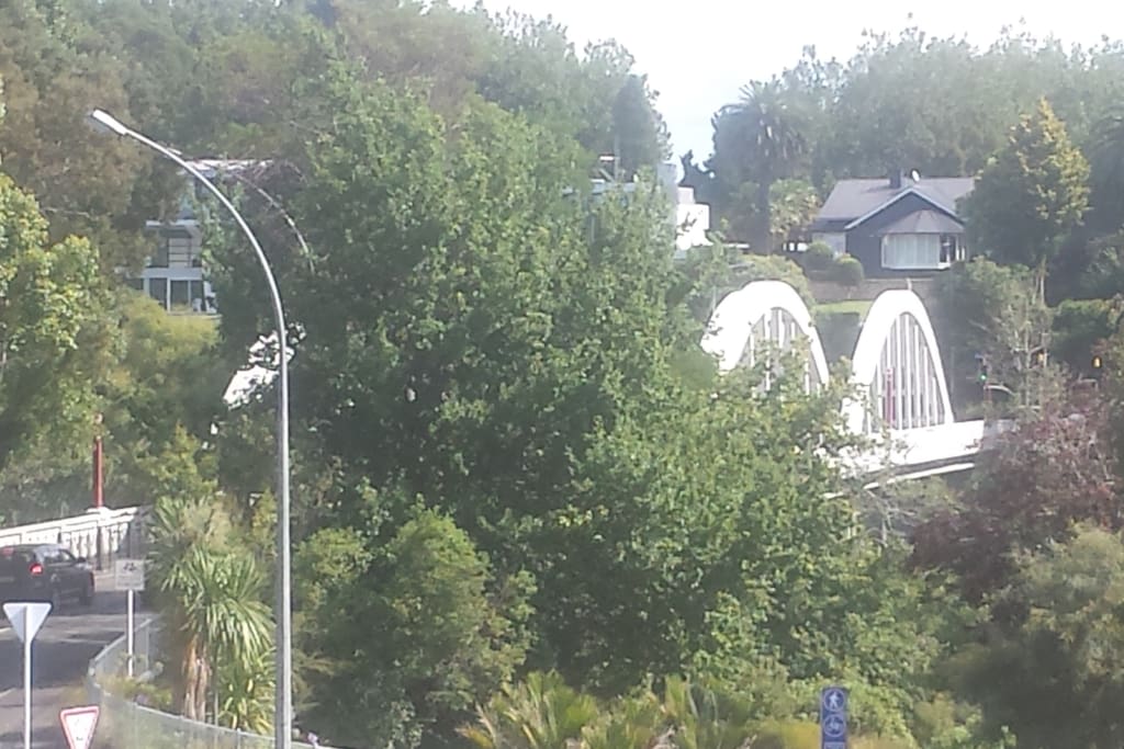 Day view from the Alfresco patio of the Iconic Fairfield Bridge/Waikato River that meets Victoria street/CBD