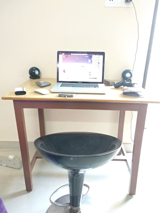 a work station in case one is on a business trip or is just a stubborn workaholic.