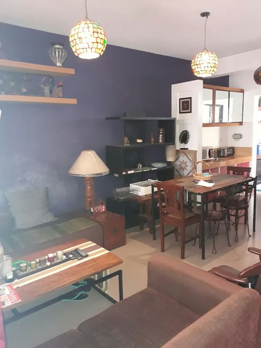 aircon living and dining with L couch- can be for 2 additional guests