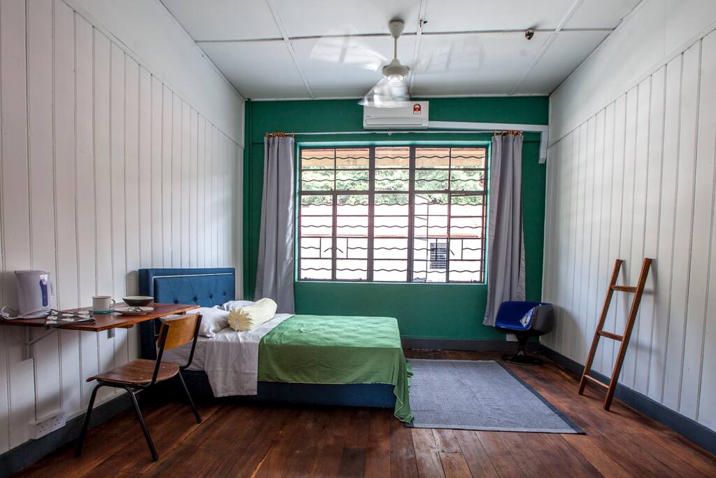 Brand-new queen-sized bed, with A/C and ceiling fan.