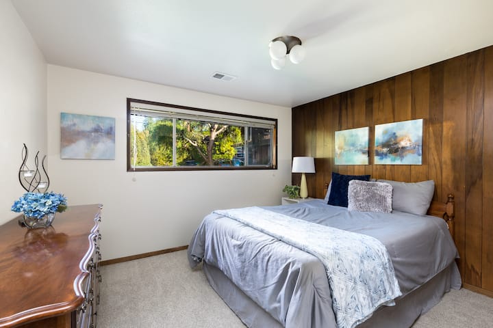 Queen bed in the third bedroom on the right. Full hanging closet with a long shelf, one side cabinet and a full dresser.