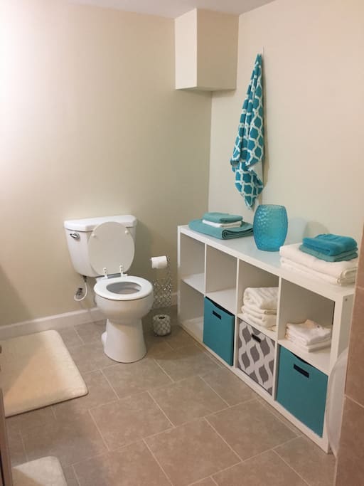 Shared bathroom with towels available