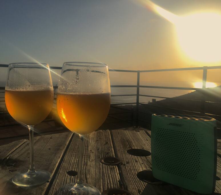 Enjoy the sunset while taking a couple of drinks with friends . . .