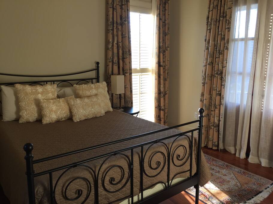 Queen bed with luxury pillow top mattress.