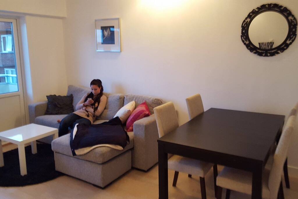 Kitchen table, sofa there you can also sleep on if you want.