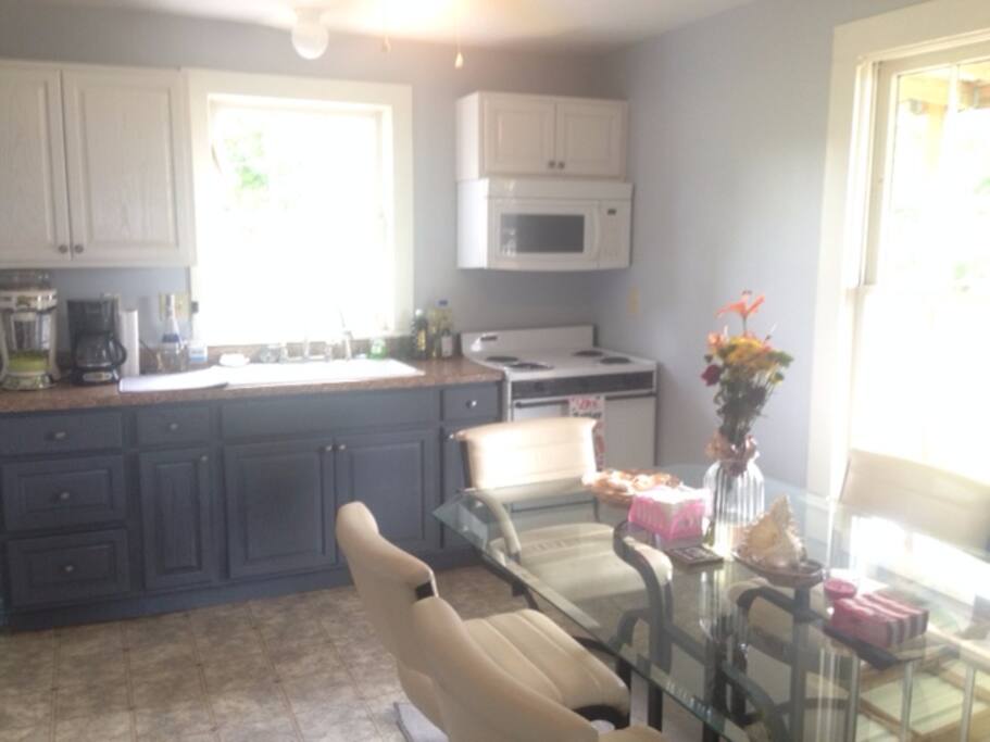 Spacious kitchen with table that seats 6 and a great place to hang out. Everyone always ends up in the kitchen in my family!
