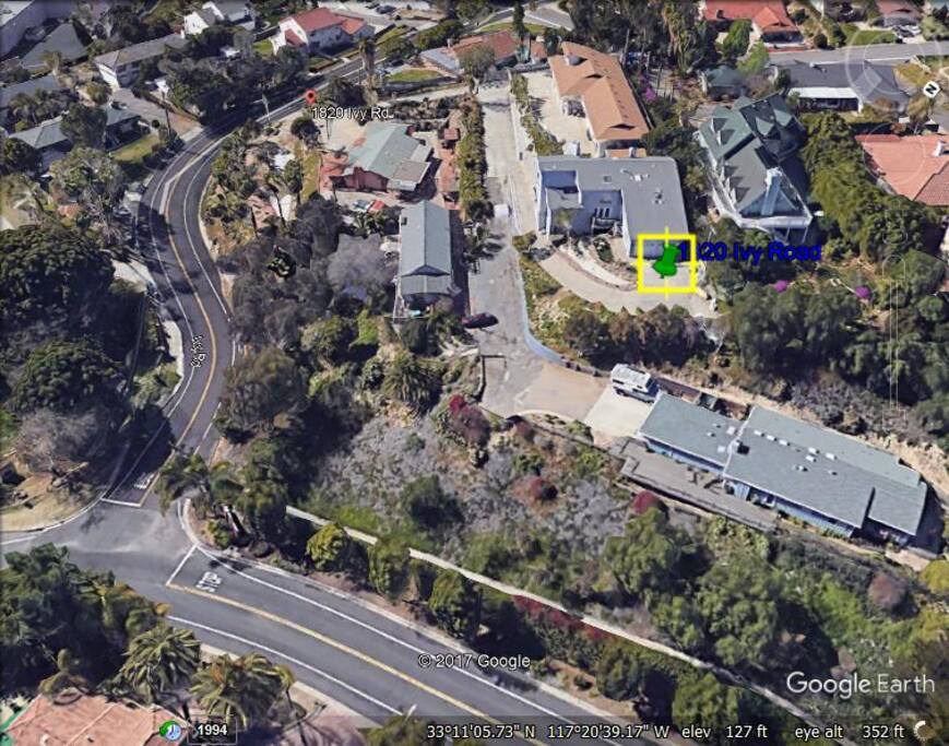 Green pin shows house location.