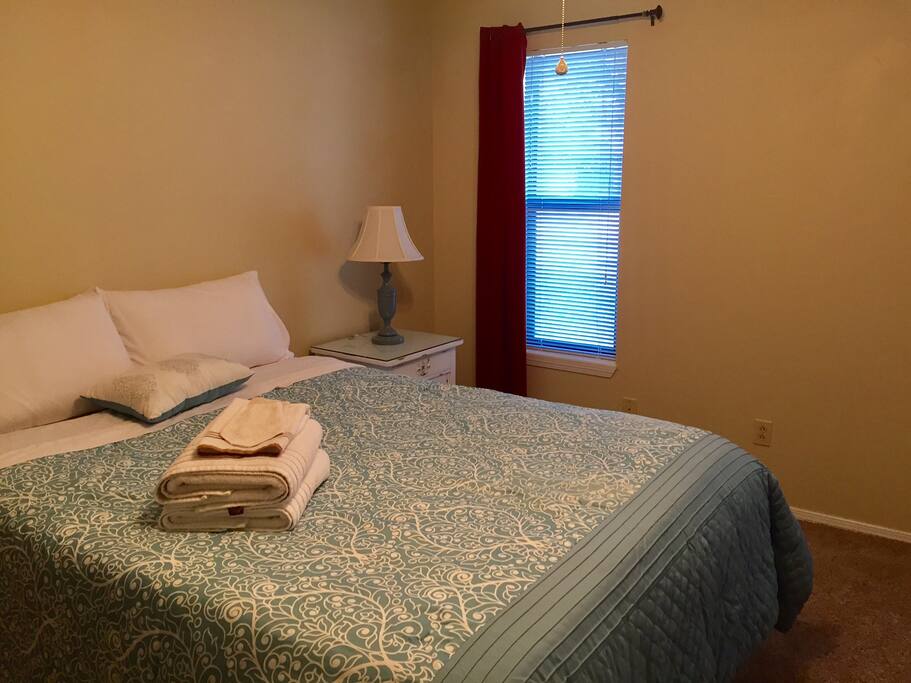 Queen bed with memory foam topper