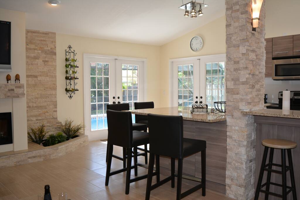 French doors overlooking pool area.