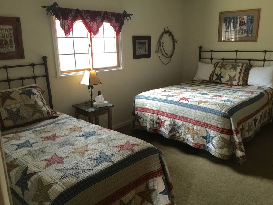 Bedroom with double and single beds