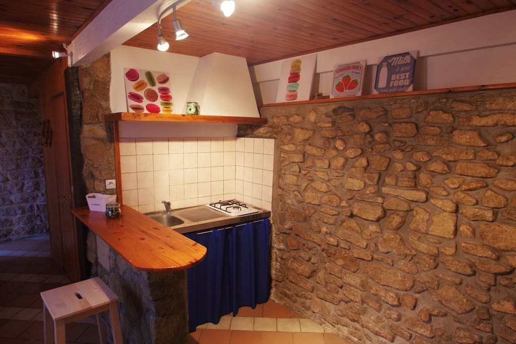 kitchen with brick wall
