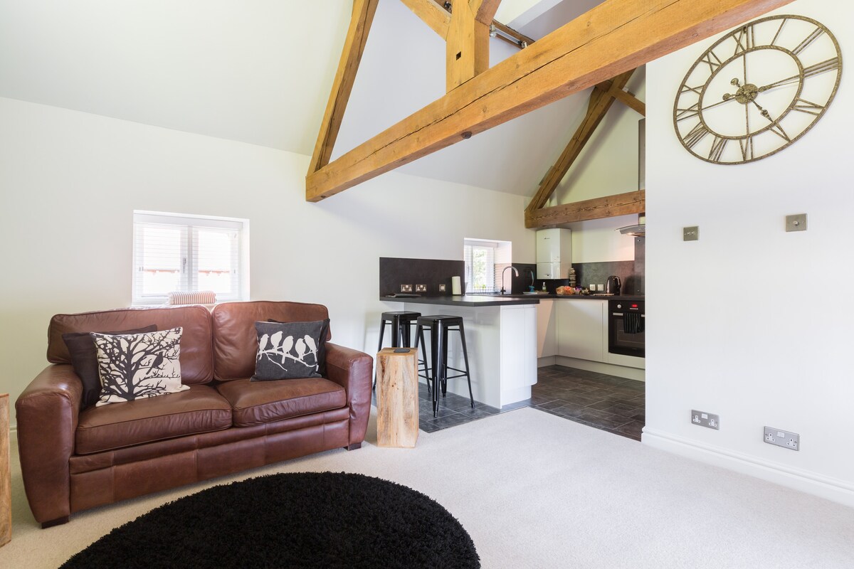 The bright and  airy living space going into the fully equipped kitchen.