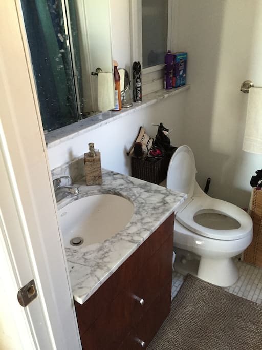 Bathroom with full size bath tab and shower