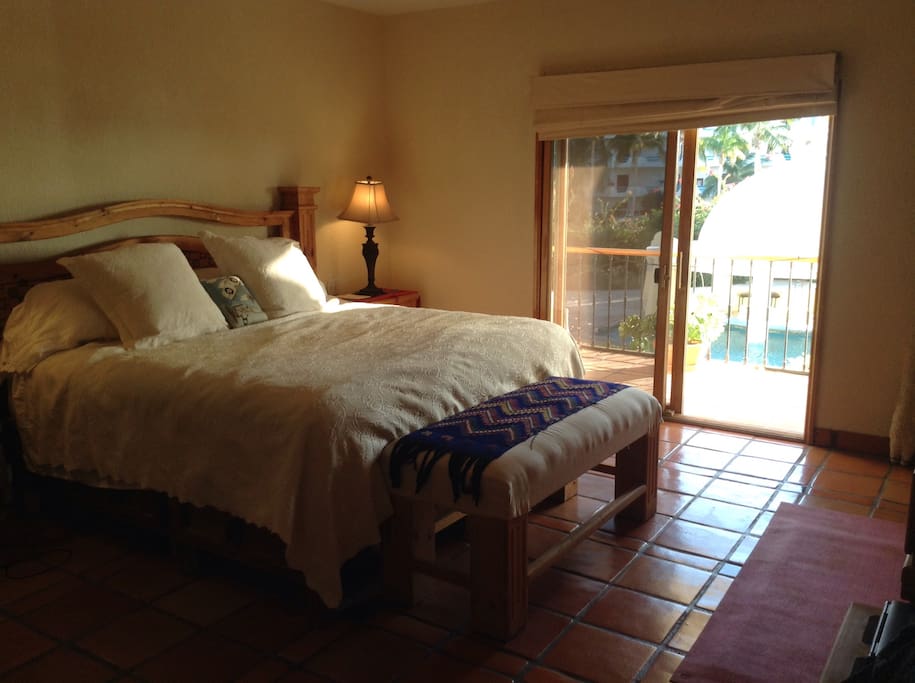 Master king sized bedroom with ensuite bathroom and terrace access.