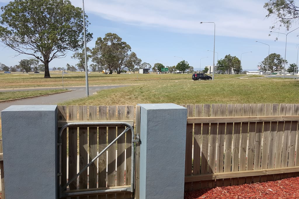 looking out the front door. 4min walk to three supermarkets, restaurants and cafes