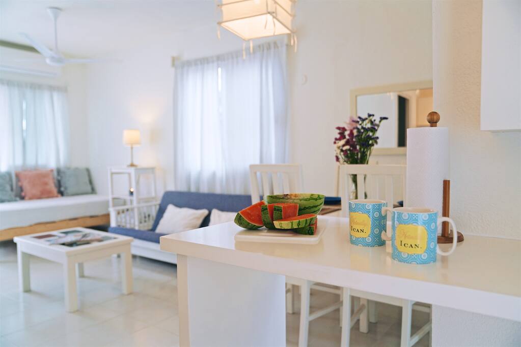 Spend unforgettable moments in the living room and dining area in Casa Naty.