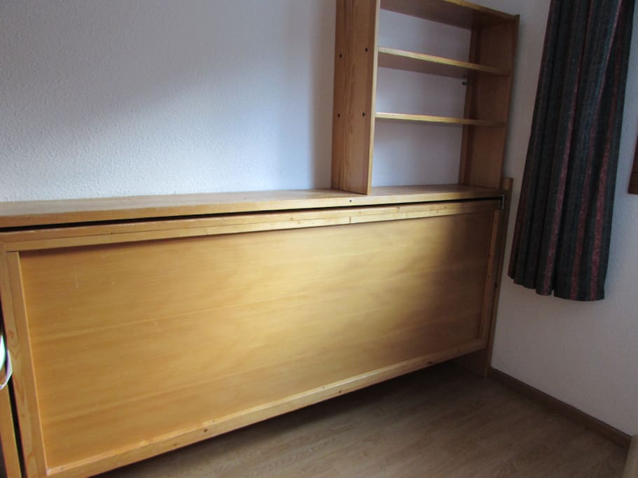 Single bed folded away