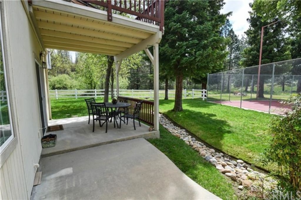 Backyard Greenbelt and tennis courts/pool.