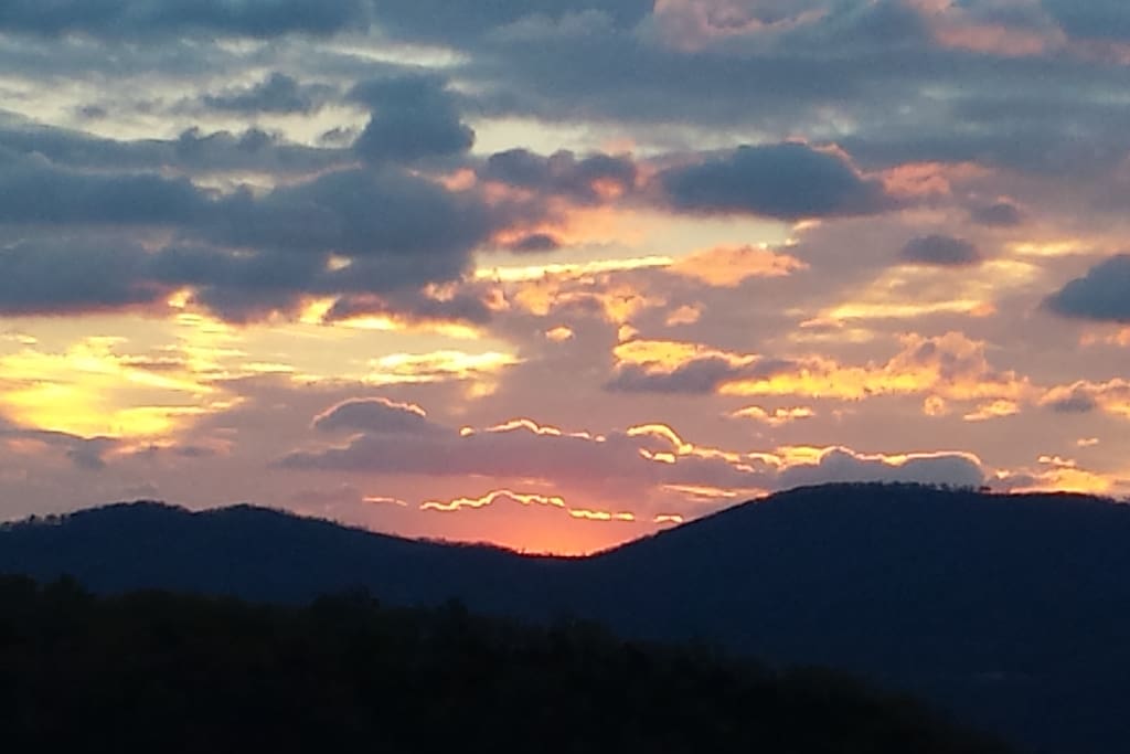 Beautiful views from decks, porch swing, and hot tub!