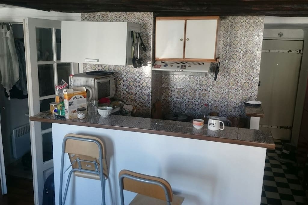 Kitchen with coffee machine and all utensils