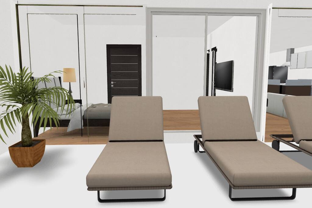 Master bedroom on the first floor with it's own bathroom and swimming pool/front beach view