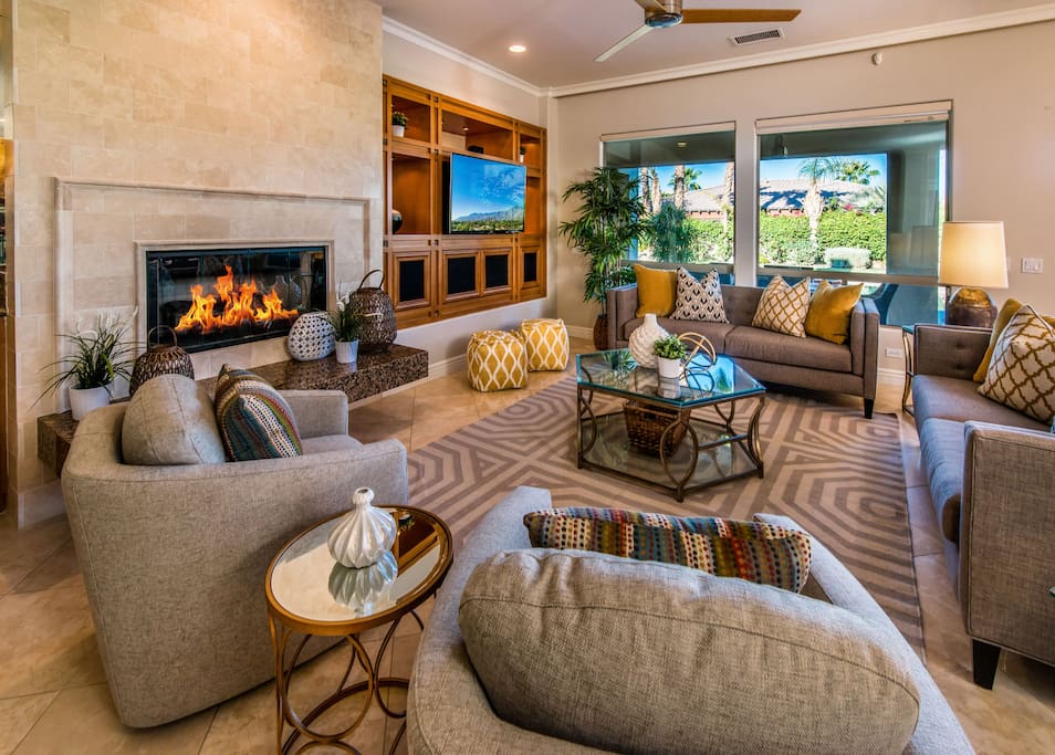 Comfortable living room with tons of seating and fireplace